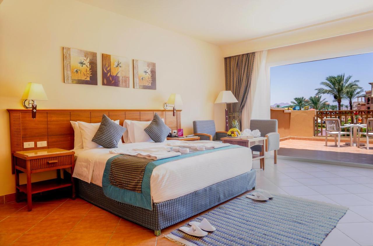 Charmillion Club Aquapark Hotell Sharm el-Sheikh Exteriör bild A room at the Hilton Sharm El Sheikh